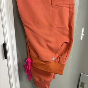 Figs Orange Jogger Pants with Pink Details